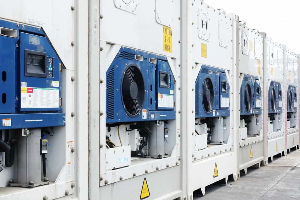 Row of refrigerated containers with their cooling units